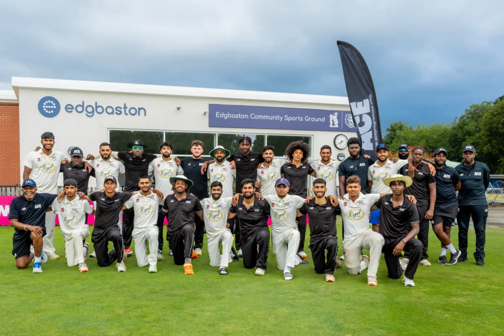 Ace players alongside opponents posing on cricket pitch